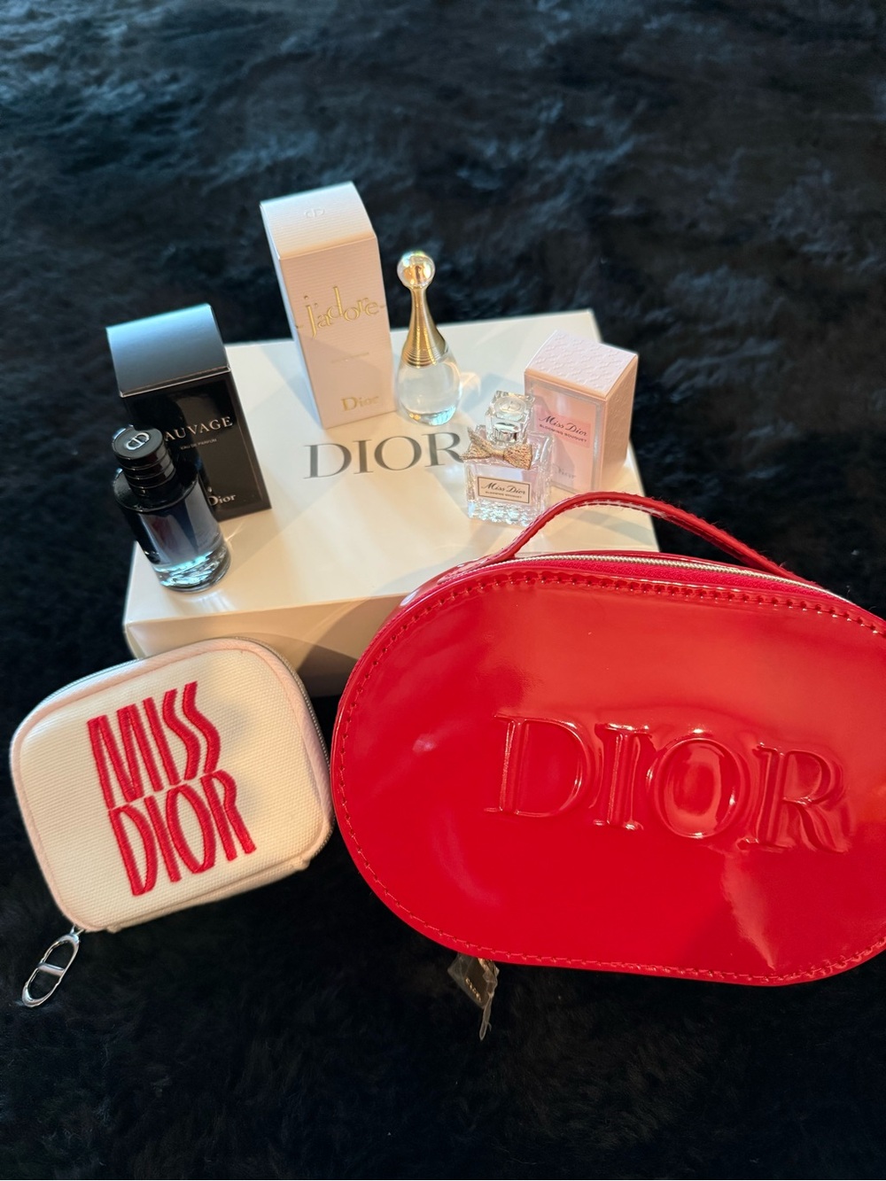 Dior Red Oval Cosmetic Case with White Miss Dior Zip Pouch